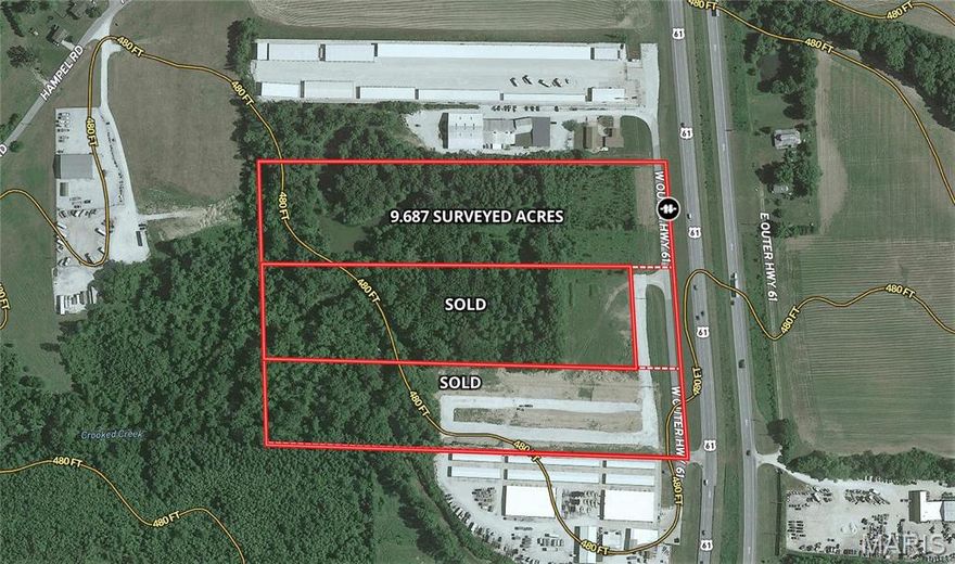 9.687 surveyed acres of mostly level ground with Hwy 61 frontage in Moscow Mills. Property is located in unincorporated Lincoln County, so very few restrictions.  Public water and sewer available. The perfect location for your new business with high visibility and high traffic counts.