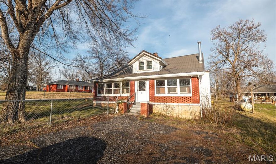 This spacious 3-bedroom, 1-bath all-brick home offers timeless character and plenty of potential. Featuring some beautiful original woodwork, the home blends classic charm with everyday comfort. Enjoy relaxing in the inviting 3-season room or take advantage of the fully chain-link fenced yard—perfect for pets, play, or entertaining.
Need extra space? The 2-car detached garage/shop provides ample room for vehicles, storage, or hobbies. A durable metal roof adds long-term value and peace of mind.
Conveniently located and full of opportunity, this home is priced to sell—don’t miss your chance. Schedule a showing today and bring your offer!