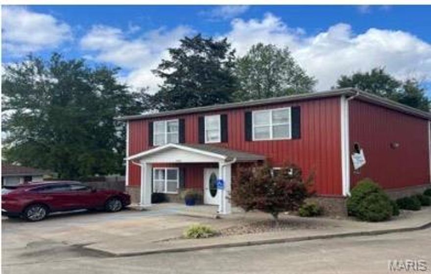 The first main level area of this building has one and a half baths, front office or seating area, office area, lots of storage, kitchen sink area, and lots of cabinets. The main level second area has two rooms plus a full bath. This area could be a third income producing area. It is not used for that at this time. (7 x 15 and 9x15 plus the bath). It also has built-in storage cabinets. The second level apartment has three bedrooms, one and a half baths, laundry facility with a washer and dryer that stay. Appliances in the apartment include the range, dishwasher, refrigerator, washer and dryer. Tenant pays for heat and air. (Electric). There is access to the apartment from inside the building off of the foyer and a separate entrance at the back of the building. The foyer is 7 x 10.