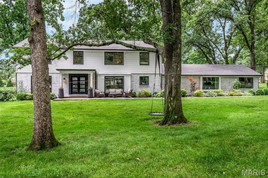 Welcome to this beautifully renovated 4-bedroom, 3.5-bathroom home offering over 3,500 sq ft of luxury living on a picturesque, park-like lot. The heart of the home is a fully custom kitchen featuring quartz countertops, huge center island, a built-in refrigerator, two ovens, a pot filler, a walk-in pantry with a second dishwasher, and a dedicated ice maker — perfect for effortless entertaining.
Adjacent to the kitchen, a convenient mudroom with custom built-in lockers provides the ideal space for storage and organization, while a second set of washer and dryer ensures ultimate convenience.
The spacious formal dining room with a charming fireplace creates an inviting atmosphere for family gatherings, while the family room with vaulted ceilings and two walls of windows showcases stunning views of the nearly one-acre lot, filling the home with natural light.
Enjoy additional features like a cozy den with dual wine refrigerators and a sophisticated home office outfitted with custom built-ins and an extra refrigerator for ultimate convenience. Every bathroom has been thoughtfully updated with high-end finishes, and the generous primary suite boasts a spa-like bath and a large walk-in closet.
Located in the prestigious Kirkwood School District and nestled in the quiet elegance of Frontenac, this move-in ready gem blends upscale living with everyday comfort. Truly a must-see!