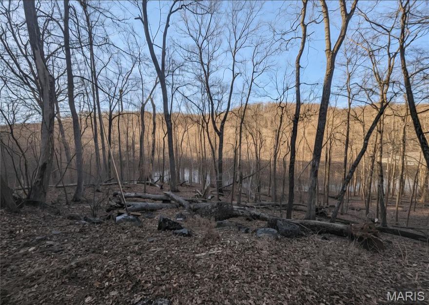 Hook, Line, and Sinker!
Are you a fisherman looking for the ultimate home base? This stunning waterfront property on Lake Robinhood offers more than just a place to build a home it offers a lifestyle. Boasting over half an acre of prime land in a secure, gated community, you’ll have front-row seats to the best views in the neighborhood.