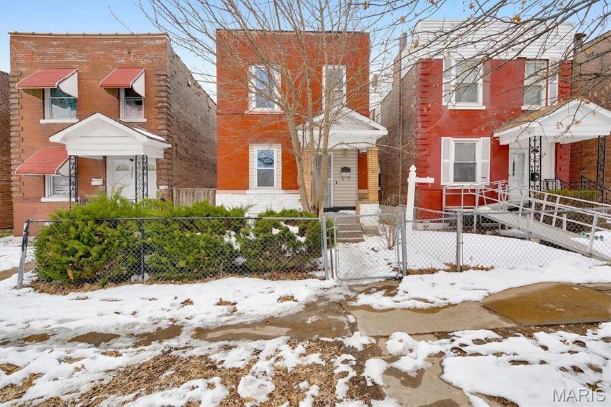 This updated two-story brick home offers a freshly painted interior, large bedrooms, and thoughtful updates throughout. The kitchen features a generous bar with butcher-block countertops, perfect for casual dining, meal prep, or working from home. Additional highlights include a main-floor half bath, main-floor laundry, a walk-up basement with exterior access, and a back deck.