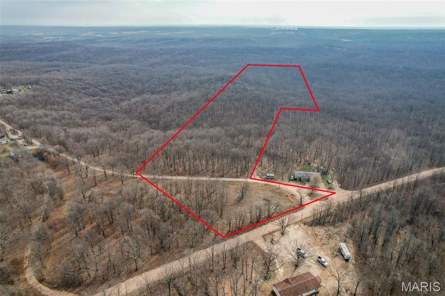 Nice wooded 30 acres west of Lebanon. Only 4 miles from Bennett Spring State Park. Build your dream home and create your own secluded oasis. The land is wooded with a small pond. New electric pole at the road. Property to be surveyed prior to closing.