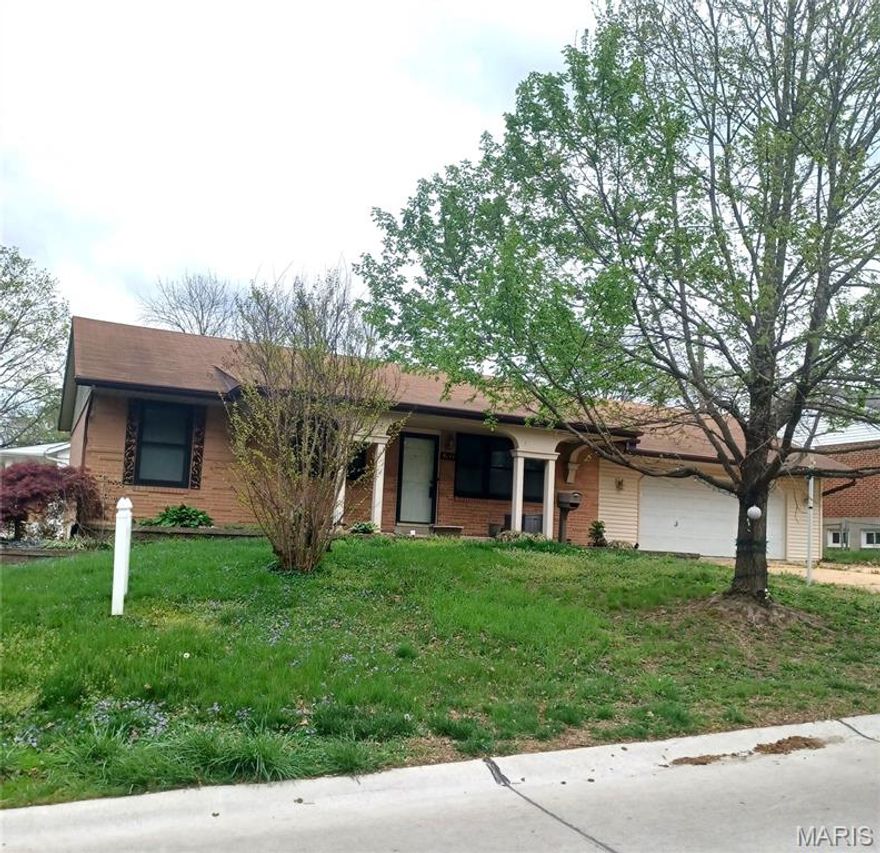 Brick 4 -sides ranch home on a corner lot *Open floorplan with rich colored hardwood flooring on the main level*Updated Kitchen with Center Island/Breakfast bar, 43" high top cabinets. Abundant Storage, Tambour (hide-away) Counter Appliance nook, Stainless Steel Refrigerator & Electric Stove/Oven, Breakfast Room*Updated Main Floor Bathroom*Pella Wood windows on main level*Finished Lower Level incl. Recreation rm., Sitting rm., Bath rm. w/ Shower Stall, Laundry rm. w/ Cedar Closet, Workshop w/ Heavy-Duty Workbench, 2 Storage Closets*There is a 27' X 24' oversized 2 car Garage with Built-In tool cabinet, Shop Lighting & Tool pegboard*Extensive Decorative-block Landscape beds*12'x 12'concrete pad Patio in rear yard*Clean and ready for your viewing.