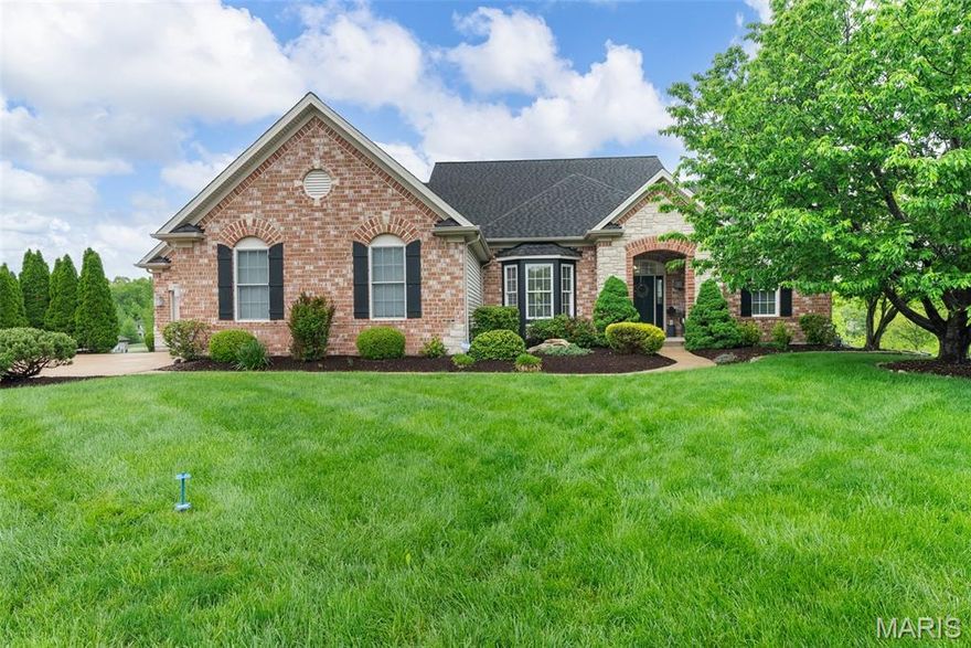 This gorgeous home is back and better than ever!  Welcome to your dream home on a peaceful 0.83-acre lot on a quiet cul-de-sac backing to serene woods! This spacious ranch offers a heated saltwater POOL, soaring ceilings, wood floors, and sun-filled windows. A 2-way gas fireplace connects the great room and hearth room. The gourmet kitchen features 42” cabinets, granite, stainless appliances, and a bright breakfast room. The luxurious primary suite has a private deck, walk-in with custom closets, and mudroom access. The finished walk-out lower level includes a rec room, 2 beds, full bath, sitting area, and full kitchen—ideal for guests or in-laws. Enjoy the oversized 3-car carriage-style garage with built in cabinets and workshop and NEW garage doors, patio with gazebo, and nearby Katy Trail. A rare gem!