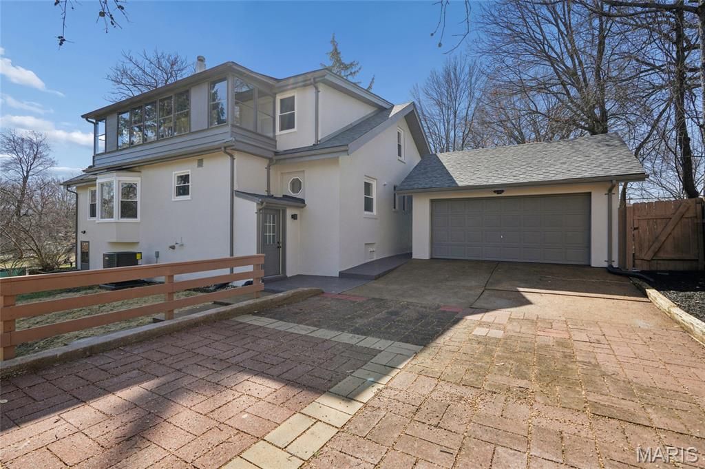 Photo of 10235 Thorpe Avenue, Overland, MO 63114 (MLS # 26012249)