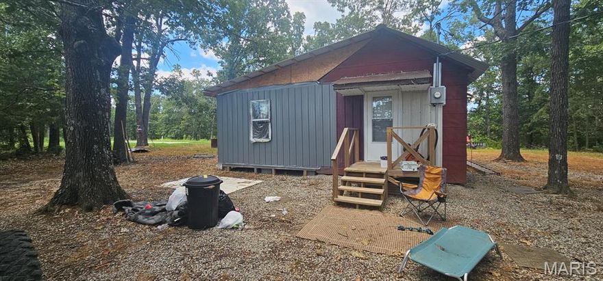 Discover your own slice of country living with this 19.5-acre property in the lower part of Perry County. Tucked away in nature yet within reach of town conveniences, this land offers both privacy and potential.
The property features a one-room 12'x24' cabin, which could turn into a full 24'x24' cabin when the rest is finished. There is electricity in the cabin with a window unit.—perfect as a getaway, hunting retreat, or a starting point for your dream home. A spacious 16'x77' pad is ready near by for a trailer or manufactured home and is already equipped with a private well, septic system, and electricity, making it easy to move in and start enjoying the property right away.
With a mix of open ground and wooded areas, the land is ideal for recreation, hunting, or simply enjoying the peace and quiet of rural Missouri. There are some Big Bucks that have been captured on the game cam. Whether you’re looking for a personal escape or a place to build your forever home, this property offers a rare combination of readiness and rustic charm. Property is unrestricted.
Don’t miss the opportunity to own acreage with essential utilities in place—schedule your showing today! Make an offer!