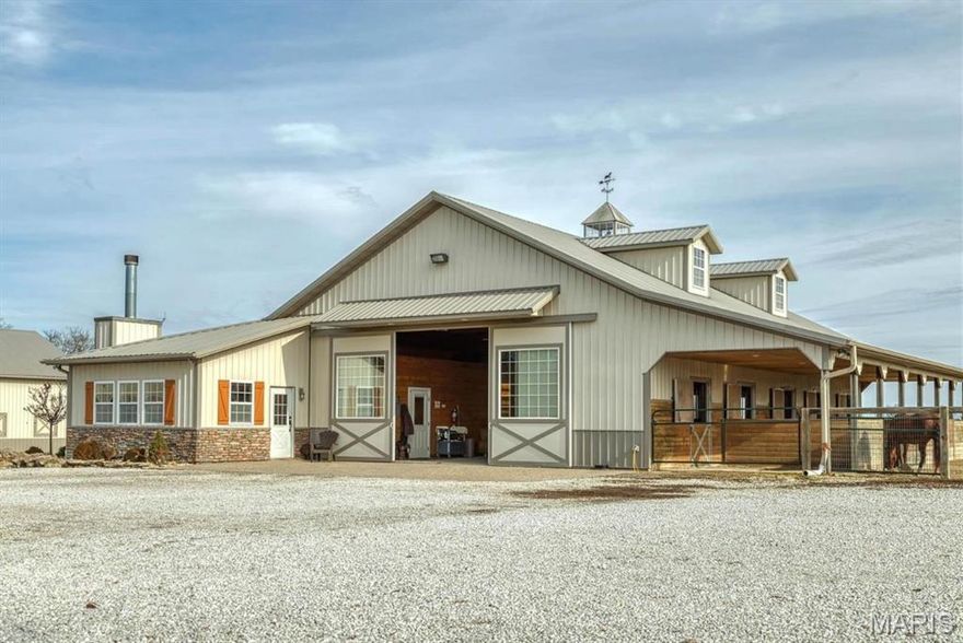 14.3+/- prime acres in Wright City. This versatile property features a stunning 2-bed, 1.5-bath Barndominium that perfectly blends rustic charm with modern, open-concept living. For the equestrian, the facilities are second to none: heated 10-stall horse barn and a massive riding arena for year-round training and events. Enjoy quiet mornings by the private 2+/- acre lake that offers excellent fishing or capitalize on the property’s massive commercial potential. With flexible zoning and subdivision possibilities, this is more than just a home, it’s a rare investment opportunity for future development or a thriving business. Your equestrian and entrepreneurial dreams start here!