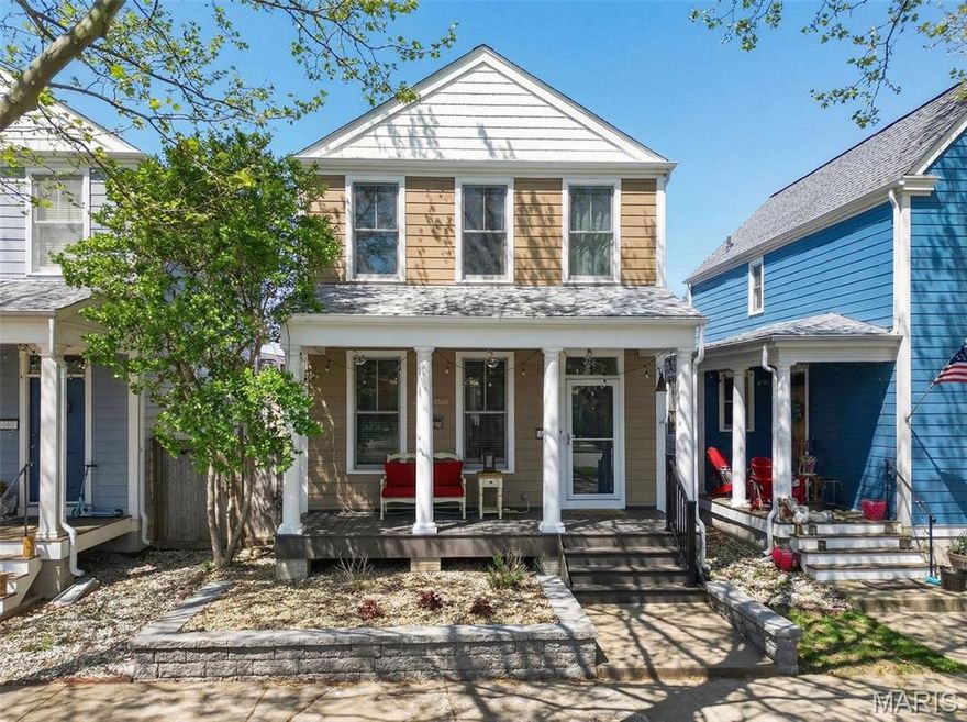 Quiet location across from large GREEN SPACE! Welcome home! Newer retaining wall & landscaping redone 2026! Low maintenance composite covered deck new Summer 2025! Beautiful HARDWOOD FLOORING in living rm, hall, kitchen, breakfast rm, powder rm & MFL. Custom GAS FIREPLACE surrounded by built in bookcases w/backlighting added November 2023. Stunning kitchen remodel done about three years ago to include 42" white soft close shaker style cabinetry w/crown molding + extra back lite glass front display cabinets! Gorgeous QUARTZ countertops to include LARGE CENTER ISLAND w/extra storage & breakfast bar! 
Coffee bar area with dual temperature control wine refrigerator. Marble backsplash! Barn door to pantry/laundry area combo. Upgraded stainless steel appliances to include GAS DOUBLE OVEN RANGE with five burners/griddle, DW, micro + SS chimney vent. Newer light fixtures! HVAC replaced August 2021! Siding painted/repaired by Siding Repair Systems 2 years ago! Architectural roof new in August 2023. 2nd floor primary suite features custom private bath w/halo light & pebble shower floor completed August 2025! Vanity area is plumbed for a double sink. 2 additional bedrooms + hall bath complete 2nd floor. Enjoy entertaining or just relaxing in your level fenced in yard w/patio covered by vaulted wood ceiling Breezeway! 
Partially finished LL w/office space & rough-in for bath. New Town has over $10 million in amenities to include 2 pools, lazy river, parks, amphitheater, Beach, Lakes & more!