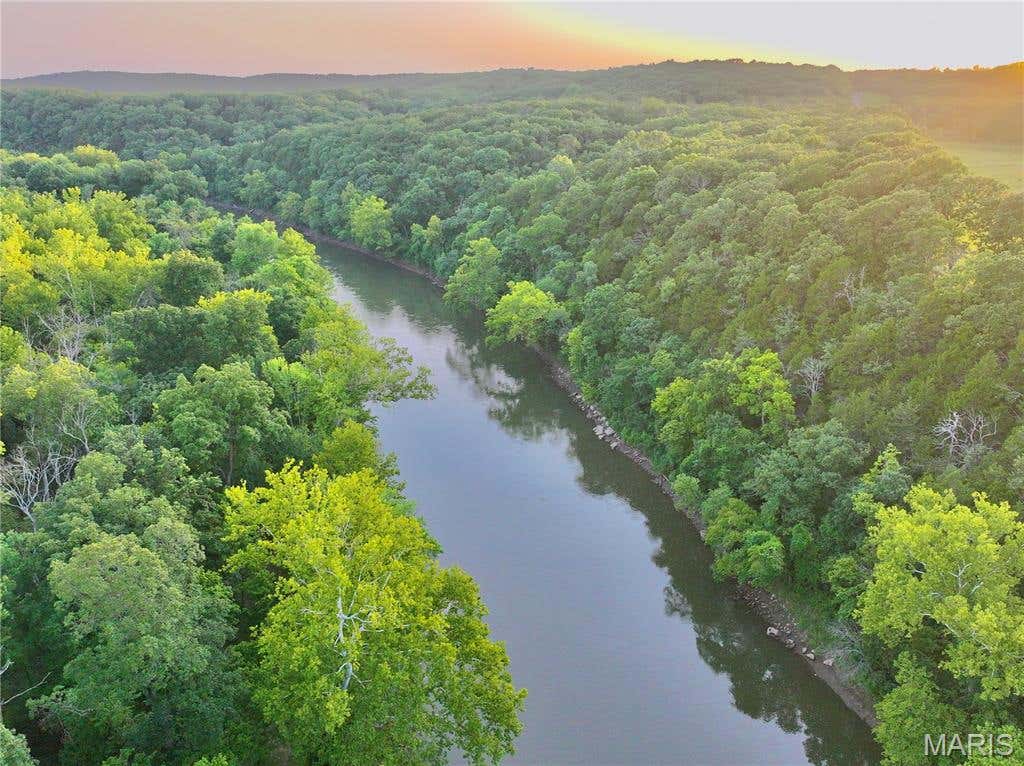 Photo of TBD SE 800 Rd. T17, Collins, MO 64738 (MLS # 26052565)
