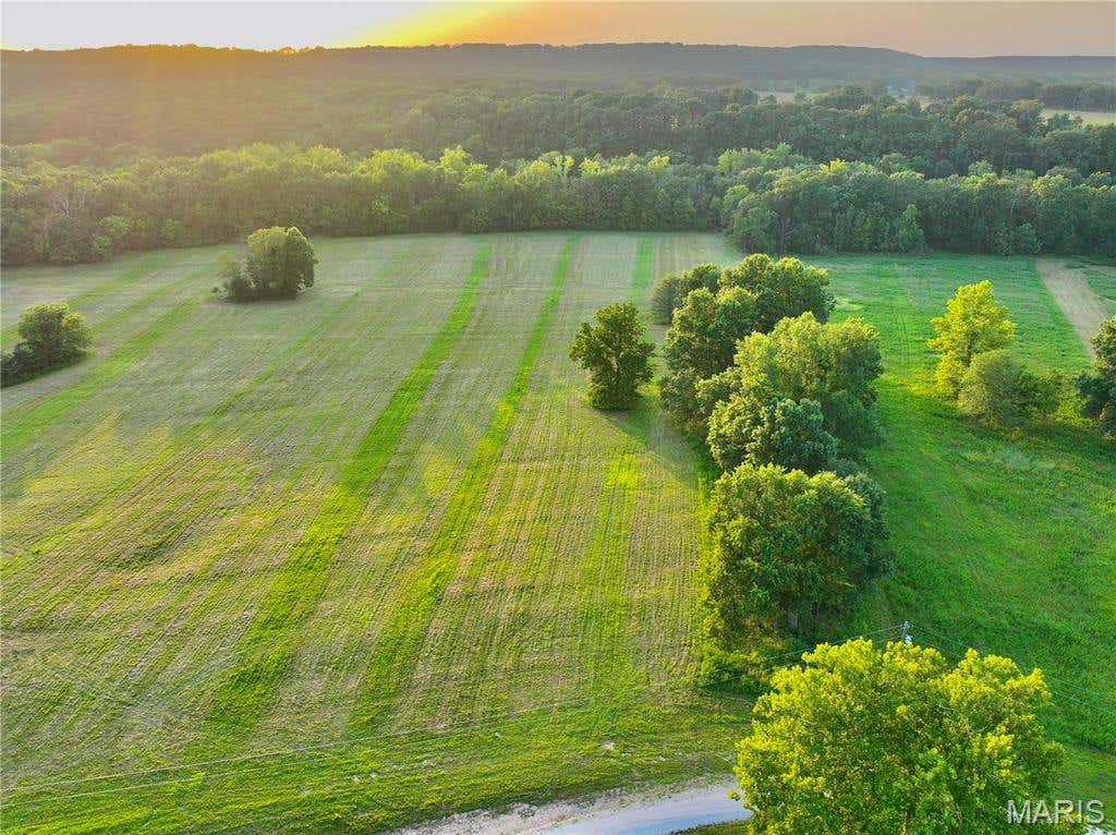 Photo of TBD SE 800 Rd. T17, Collins, MO 64738 (MLS # 26052565)