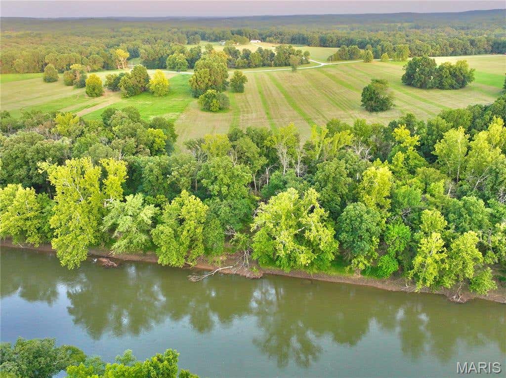 Photo of TBD SE 800 Rd. T17, Collins, MO 64738 (MLS # 26052565)