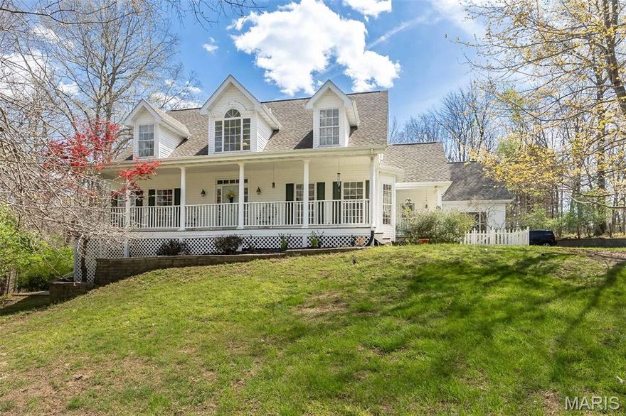 Nestled on more than 3 acres along a quiet bluff above the Meramec River, this stunning custom-built farmhouse-style home offers the perfect blend of charm, space, and serenity. With 3 bedrooms, 3.5 baths, this is the retreat you've been waiting for. Setting the tone for this one-of-a-kind property, is a covered porch running the full width of the home, offering a warm and welcoming greeting for family and friends. Inside, the entry foyer draws you in with gleaming hardwood floors that flow throughout the entire first floor. To the left, a generous dining room is ready for both formal entertaining and everyday gatherings, while a cozy living room to the right offers an ideal space for quiet conversation or a home office. The beautifully updated kitchen is the heart of the home, featuring solid surface counters, custom cabinetry, an electric cooktop, double ovens, and a breakfast bar. A large window offers views of the charming covered side porch and garden below. The breakfast room flows naturally into the home's true crown jewel — a 41' x 10' screened-in porch, perfect for morning coffee, evening cocktails, or simply soaking in the peaceful surroundings. 

The two-story family room is anchored by a wood-burning, see-through fireplace with a beautiful stone surround. Soaring vaulted ceilings and a dramatic wall of windows flood the space with natural light, while French doors open directly onto the screened-in porch — seamlessly blending indoor comfort with outdoor beauty. The primary suite features a bay window with door to screened in porch, and an ensuite with double sinks, a soaking tub, separate shower, and a large walk-in closet. A powder room and a spacious laundry/mudroom perfectly round out the first floor.

Upstairs, two generously sized bedrooms with an abundance of natural light share a hall bath. The walk-out lower level offers flexibility with a large rec room, workshop, and sleeping area or office, and a full bath — all opening to a patio that's just waiting for a firepit and a starlit evening.

And just when you think you've seen it all — tucked off the laundry room, a private staircase leads to a spectacular 16' x 26' bonus space complete with skylights, book shelves, and a closet. Whether you envision an artist's loft, a yoga studio, a home office, or a fourth bedroom, the possibilities are endless.

Finally, if you're a golfer, you're within 5 miles of Aberdeen, Crescent Farms and Pevely Farms golf courses. Minutes from highway 44, close to dining and shopping, and award winning Rockwood schools. This is more than a home. It's a lifestyle.