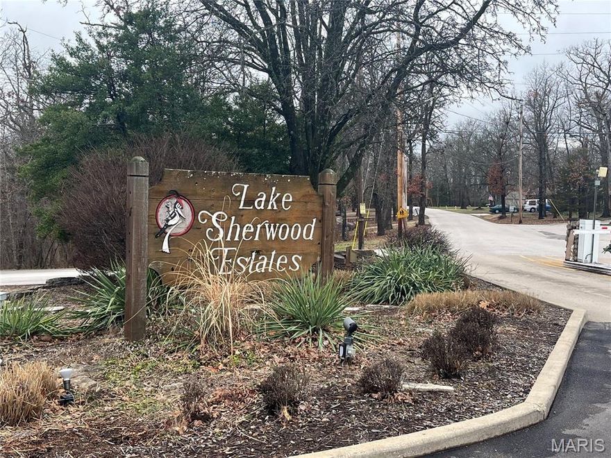 Welcome to Lake Sherwood Estates! A beautiful and very buildable lot, with a very gentle slope for a possible walkout. You'll love this beautiful gated community and all that it offers for a secluded lake-life. Nature, private security, lakes, a beach, a pool, ball diamond, parks, trails, wildlife, activites (4th of July fireworks, Memorial Day/Labor Day, Chili Cook-off, Bands on the beach!, Christmas/Valentine's Day/New Year's Celebrations and more! Whether your just enjoying the amenities, social events, or looking for a great place to build your future forever home, Lake Sherwood has so much to offer and the price is so right! Show at will but all showings must be accompanied by an agent.