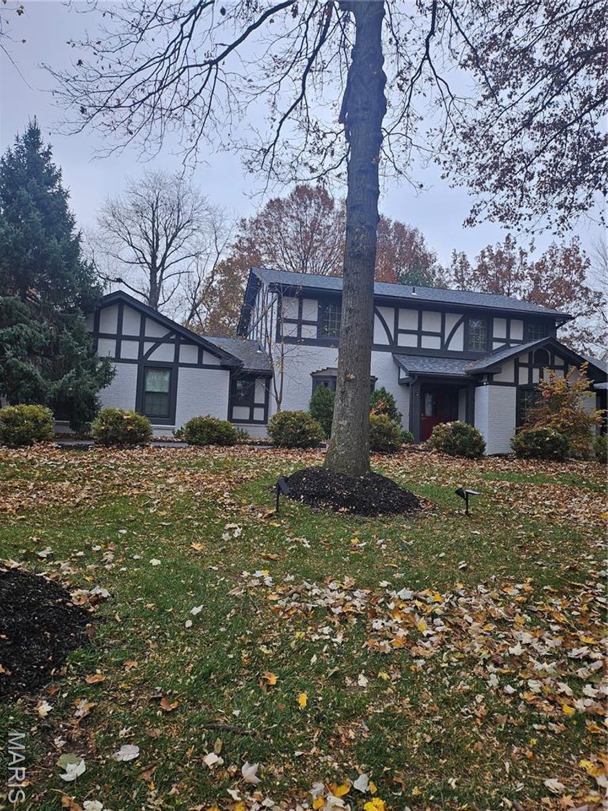 Spacious two story with Master bedroom located on the main floor.  Fenced yard, 3 car side entry garage.  Half circle driveway.  Recently renovated Kitchen and Master bath.  Excellent location close to 270 and 64 Hospitals and Country clubs.