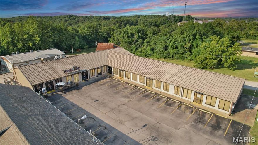 * Previous buyer's financing fell through. Incredible opportunity to purchase a 100% occupied retail center in Hillsboro, MO with a 10% cap rate! Well-established, Local favorite, Mexican restaurant occupies 50% of the main level with recently expanded space and self-improvements for long-term success! Few opportunities come along like this for turn-key, investment cash-flow! Main level is 9968 sq ft and fully accessible lower level is as well! Since original listing, Seller has added Marquee signs at a cost of $15,000 and has paved & striped the lower parking lot at a cost of $12,450.
Tenants include: Taco Tequila Bar and Restaurant, Emre Collective Studio, Bella’s Closet, Hillsboro Chiropractic, Excel Temporary Services, Cemtech Materials Corporation.