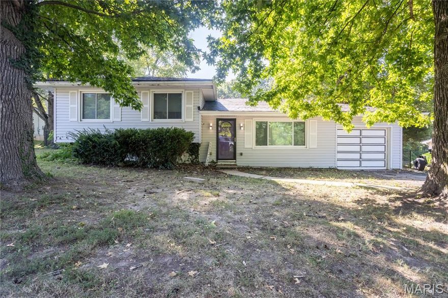 HOME IS BEING SOLD AS-IS. No HOA fees, only county restrictions. Relax and enjoy starting or ending your day watching the deer and turkey stroll across the yard. It's like being in the country, yet right in the middle of town. Motivated Seller! Schedule your showing appointment today!