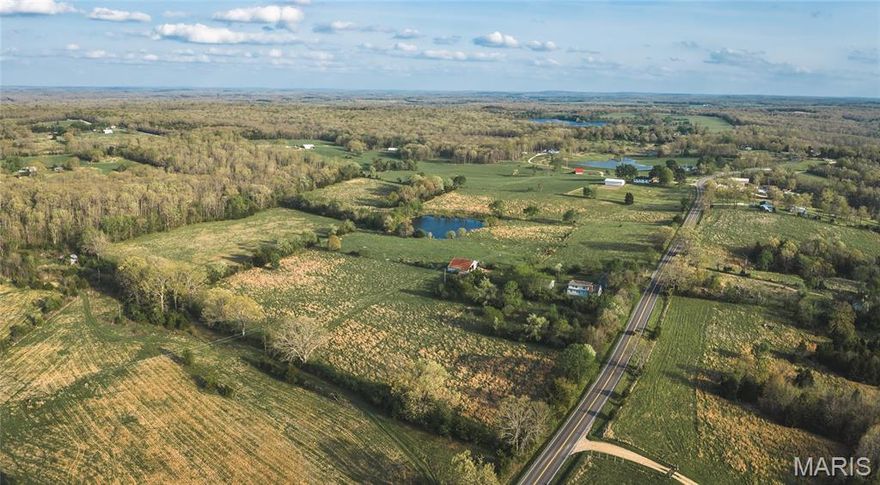 Amazing 44.5 acres of opportunity in Steelville, Missouri located along Highway 19 with outstanding highway frontage and easy access. This versatile property offers the perfect blend of open pasture, wooded acreage, and natural water features, making it an exceptional fit for livestock, recreation, hunting, or future homesite development! The land is well-equipped for agricultural use with perimeter fencing and cross-fencing already in place. A large hay barn provides immediate utility for equipment, feed, or livestock operations. Additional improvements include a detached two-car garage with concrete floors and an extra storage building. Outdoor enthusiasts will appreciate the established wildlife presence, including deer frequently seen across the property, along with a scenic wet-weather creek running along the back boundary. A large pond is also located on the property and may offer potential for fishing and recreation. With multiple potential build sites, this tract is equally suited for a private country estate, recreational retreat, working farm, or long-term investment property. Utilities are available on site including well, septic, and electric. The existing residence present on the property is being sold as-is, with value primarily attributed to the land and improvements. Schedule a showing today to look at your next opportunity!
