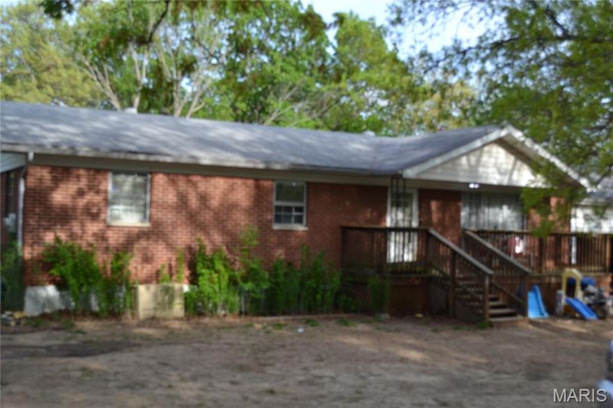 Looking for room to grow - Come see this 3 bd 2 bath ranch home with 9.48 acres+/- is ready for you to come make it yours. The home of has a lot of potential. Still has the original Hard wood flooring, front porch, and rear deck, appliances within the last 5-6 years, newer 500 ft well and so much more. Spacious main level offers 3 bedrooms and a full bath, 2 car oversized  garage, deck and walkout basement. The lower level has a lot to offer with the full bath, wood stove chimney, step out to your  9+ acres that includes 2 additional outbuildings. Most of the property is wooded but has a lot of potential, don't miss the opportunity to own this great home with and acreage too.