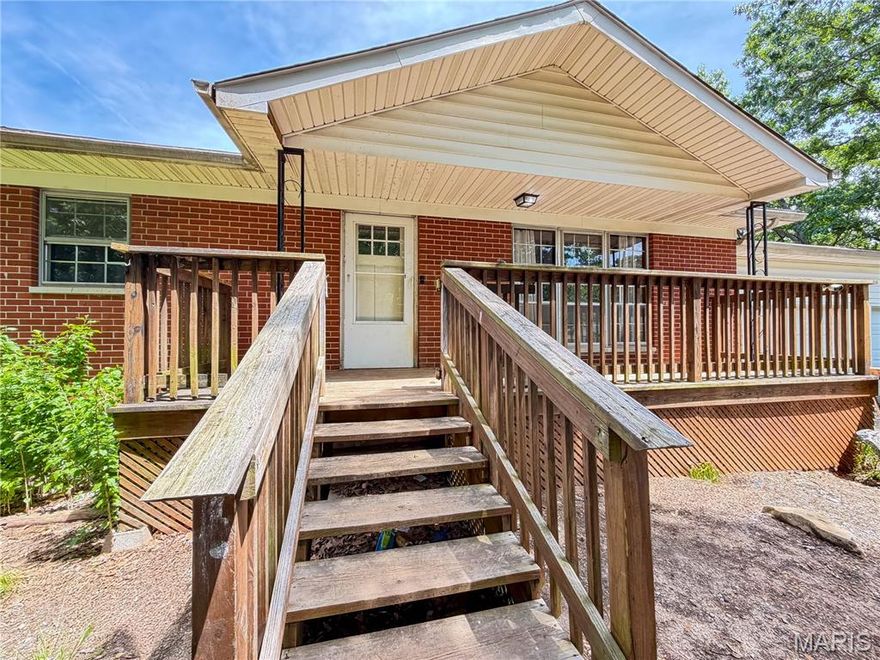 Looking for room to grow - Come see this 3 bd 2 bath ranch home with 9.48 acres+/- is ready for you to come make it yours. The home of has a lot of potential. Still has the original Hard wood flooring, front porch, and rear deck, appliances within the last 5-6 years, newer 500 ft well and so much more. Spacious main level offers 3 bedrooms and a full bath, 2 car oversized  garage, deck and walkout basement. The lower level has a lot to offer with the full bath, wood stove chimney, step out to your  9+ acres that includes 2 additional outbuildings. Most of the property is wooded but has a lot of potential, don't miss the opportunity to own this great home with and acreage too.