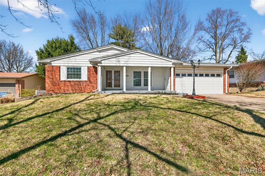 This charming ranch-style home in Florissant offers a spacious and functional layout featuring 3 bedrooms and 2 bathrooms across approximately 1,673 sq. ft. of main-level living space. The interior has a large living room with a cozy fireplace, a formal entry foyer, and a kitchen equipped with ample cabinetry and under-cabinet lighting. Additional highlights include a 2-car attached garage, a full walk-out basement providing excellent storage or recreation potential, and energy-efficient updates throughout. This property combines classic appeal with modern conveniences for a comfortable lifestyle.