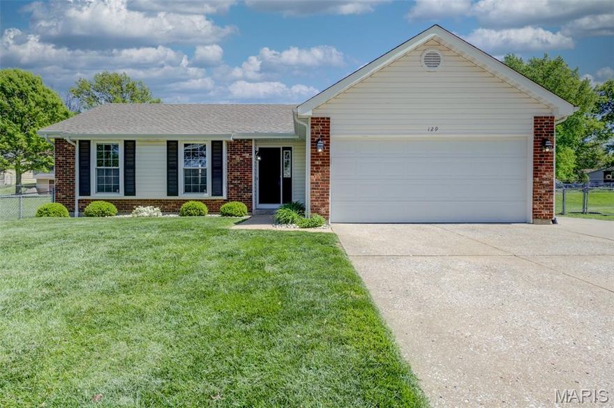 Welcome to 129 Del Oro Dr in the sought-after Fort Zumwalt School District! This beautifully updated 3-bed, 2-bath home offers 1,448 sq ft of move-in ready living space and is just a short walk to South High School—perfect for busy schedules and activities. There are so many updates to share with you.  New LVP throughout the main level, new carpeting in all the bedrooms. The kitchen, bathrooms, and light fixtures are all updated as well.  No need to worry about the HVAC system because it was updated in 2021, and the roof is about 10 years young.  The lower level has an updated family room with carpeting for extra living space.  The beautiful master bath and hallway bath are stunning. The kitchen granite countertops finish off the updated kitchen.  All appliances stay including the washer, dryer, and refrigerator.  What more can you ask for?  Let's talk about the exterior of the home.  Enjoy a spacious 2-car garage, a large storage area, and a backyard shed for all your lawn and outdoor storage needs. Step outside to a covered patio overlooking a large, fenced yard with great landscaping—perfect for relaxing or entertaining.  This is a maintenance free home, inside and out.

This one truly will not last long! Call today to schedule your private showing and see it for yourself.  This could be your new home, but don't wait to long or it will be gone.