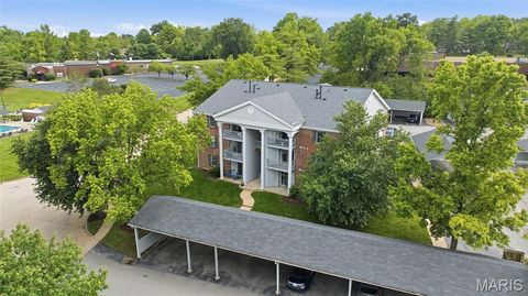 Photo of 7600 Triwoods Drive #E, Shrewsbury, MO 63119 (MLS # 26031741)