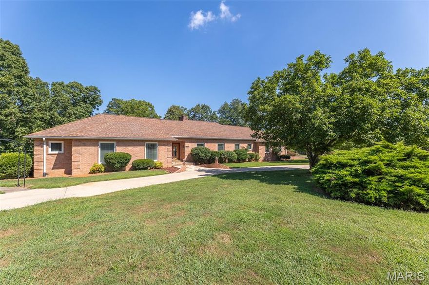 Step into timeless elegance with this stunning 3 bedroom, 3 bath home nestled in a desirable subdivision in a great location close to shopping, restaurants, McLane walking park and the hospital! From the moment you enter, you're greeted by beam-vaulted ceilings and a striking masonry fireplace. This once checks off all the boxes with LR, FR, large kitchen and dining rooms and large master bedroom & bath!  The bright sunroom is one of my favorite features and opens to a luxury patio oasis-ideal for relaxing or hosting guests. With adding a new roof just recently, that is one expense taken care of for peace of mind for years to come! The oversized garage offers more than ample room for parking & storage, and the private backyard on this corner lot provides peace and seclusion. A true blend of classic charm and refined comfort-this home is one you don't want to miss.
