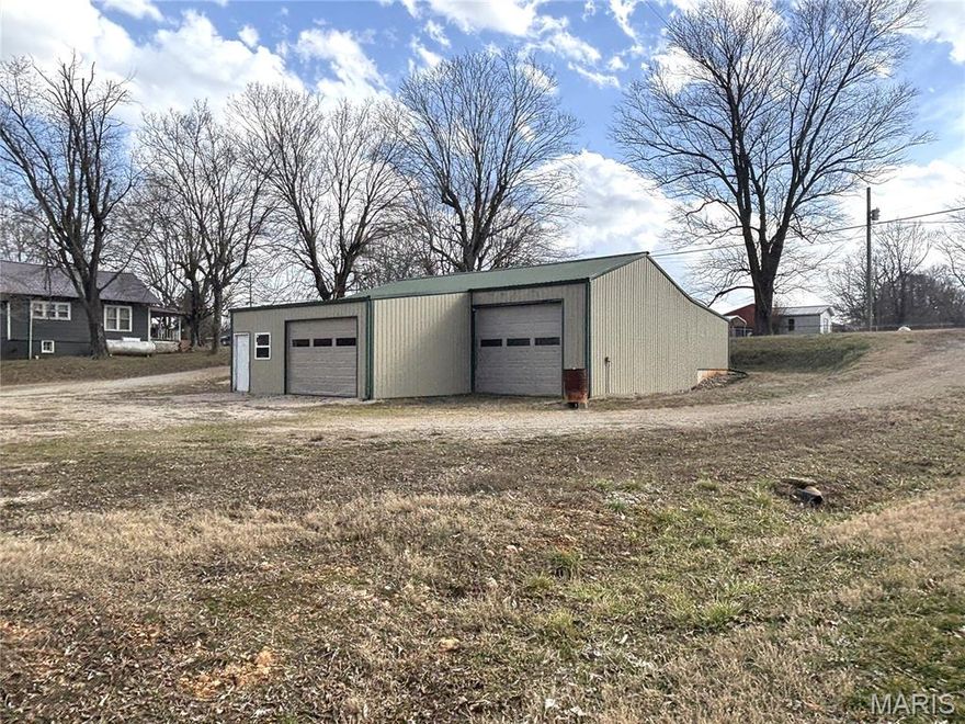 This 1,730 square foot, multi-purpose commercial building can accommodate a variety of businesses. The space was previously used as an auto repair shop and is currently being used as a retail and storage space. The building is insulated and fully equipped with electrical service and heating and cooling to ensure year-round comfort. High-speed internet service is available, making it ideal for offices, retail operations, or other commercial use. Public water and a functional septic system are in place, conveniently allowing for bathroom facilities onsite. 
The open and adaptable layout provides flexibility to customize the interior to suit your specific needs. With solid infrastructure and key amenities already established, this property offers both practicality and long-term value. 
The property is in close proximity to Clearwater Lake and Sam A. Baker State Park. With the building being equipped with 2 overhead doors, and a spacious circle drive, it would be an ideal spot for boat or camper storage; the property also offers Hwy 34 frontage.
Whether you are looking for an office, a shop, storage facility, or commercial space, this place can adapt to it all.