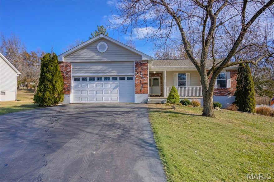 Looking for a great 3 bed 2  bath house is a very well desired neighborhood? Look no further. This freshly painted home offers newer fixtures, new carpet in the primary bedroom, newer updated primary bathroom, hardwood floors throughout main living area, an attached garage and beautiful back yard. This ranch has 3 bedrooms and 2 full baths on the main level as well as main floor laundry. The kitchen/livingroom opens up to the fenced in back yard or you can sit on the cute front porch and enjoy to nice days. The full walkout basement is unfinished and ready for you to put your personal touch on it. There is also a nice sized concrete room in the basement that has many uses. Did I mention this house backs to the lake and common ground that has the pool!!! Call today for more details so you don't miss out!