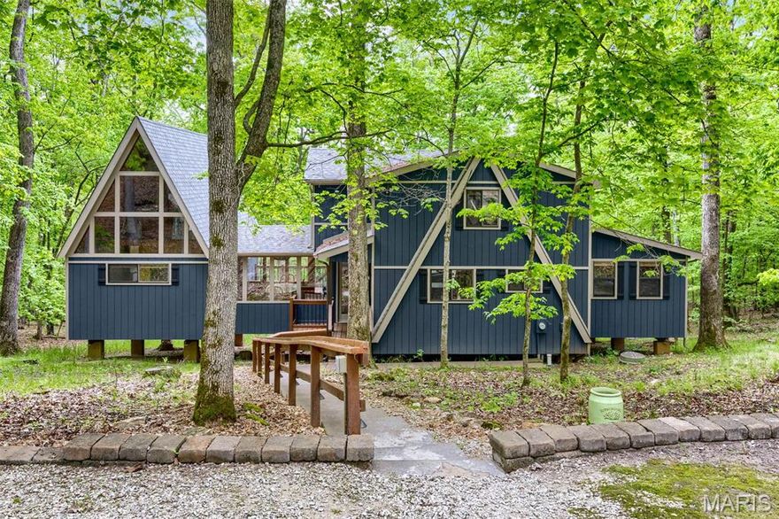 Welcome to 2507 Alpine Woods—your secluded retreat. The charm of this classic chalet meets modern comfort on 3.92 private, wooded acres near Innsbrook’s largest lake, Lake Alpine (with boat launch) and many wonderful trails nearby. . The primary suite, originally designed as a light-filled chapel, lives like its own private chalet—adjoined to the main home by a window-wrapped dining/sunroom. Inside, a wall of windows and soaring two-story vaulted ceilings create a dramatic, light-filled escape, complete with a private sitting area and full bath. The open main living space features a spacious kitchen flowing into the great room, where a stone fireplace and floor-to-ceiling windows bring the outdoors in. The dining/sunroom opens to a private deck, while the expansive main deck overlooks the peaceful forest. A second primary bedroom with full bath is on the main level of the larger chalet, with two more bedrooms, a full bath and a loft upstairs—comfortably sleeping 11. Offered fully furnished with in-home laundry and a dishwasher, this home blends everyday ease with timeless chalet appeal. This chalet could function as a short-term rental though current owners have not rented it.