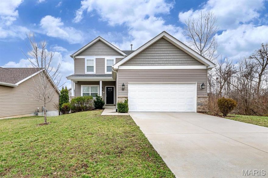 This beautiful home offers great curb appeal with a covered front porch and stone veneer exterior. The main level features 9’ ceilings, wood flooring, a spacious great room with recessed lighting and a gas fireplace, and an open kitchen with stainless steel appliances, a center island with 42" cabinetry, bay window, and a door leading to a large composite deck. Upstairs includes laundry, a spacious primary suite with a coffered ceiling and walk-in closet, a luxury bath with a double adult-height vanity, soaking tub, and separate shower, and two bedrooms complete the upper level. The professionally finished walk-out lower level offers a large rec/family room, full bathroom, additional bedroom, and storage area. Additional features include dual HVAC systems and a fully fenced backyard with vinyl fencing. Subdivision amenities include a playground, pavilion, pickleball courts, and common ground. Move-in ready and conveniently located near shopping, dining, and major highways. Showing starts on 3/19.