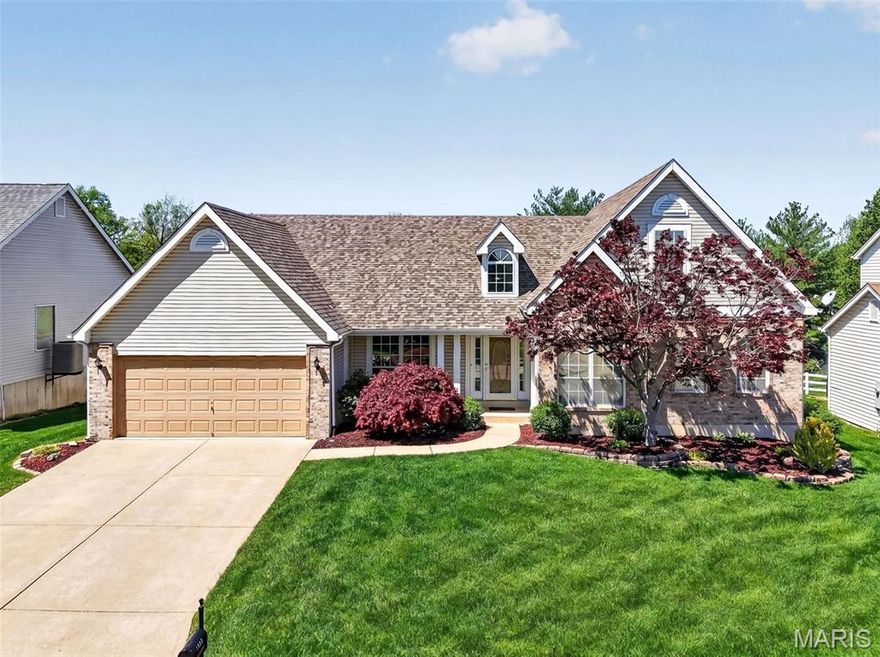 Impeccably maintained, one owner home with an open view of the 17th hole at The Falls Golf Course! This impressive 1.5 Story home offers two bedrooms on the main, 2 bedrooms upstairs and a finished lower level with large rec room, cedar closet, and an Office/Flex Room for a total of 3,679 sq ft of finished living space. The exterior is well cared for with brick, vinyl siding, large covered front porch, two car garage, coach lights, landscaping and lawn irrigation. Features included vaulted Entry Foyer, Den and Dining Room with cased openings, vaulted Great Room with a gas fireplace featuring floor to ceiling brick, a wet bar, Breakfast Room with bay window, main floor Laundry Room, Kitchen with vaulted ceilings, wood raised panel cabinets, Island with seating bar, stainless steel appliances, Bosch dishwasher and tile backsplash. The spacious Primary Bedroom Suite has double door entry and a bay window.  There is a shower, soaking tub and a double bowl vanity with a dressing table in the Primary Bath. The roof has newer architectural Shingles, downspouts and facia, all replaced in 2024. Windows along the back of the home in the Kitchen, Breakfast Room, Great Room and Primary Bedroom were replaced in 2024. Residents can enjoy the neighborhood pool and tennis/pickleball courts. There is easy access to Highways 70, 364 and 40/61, shopping, restaurants, parks, services and more.  Students will attend desirable Fort Zumwalt schools.  Beautiful home, lovely golf course setting, amazing location!