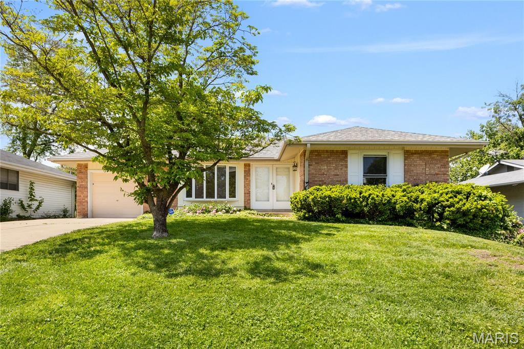 Photo of 1667 Schulte Hill Drive, Maryland Heights, MO 63043 (MLS # 26026356)