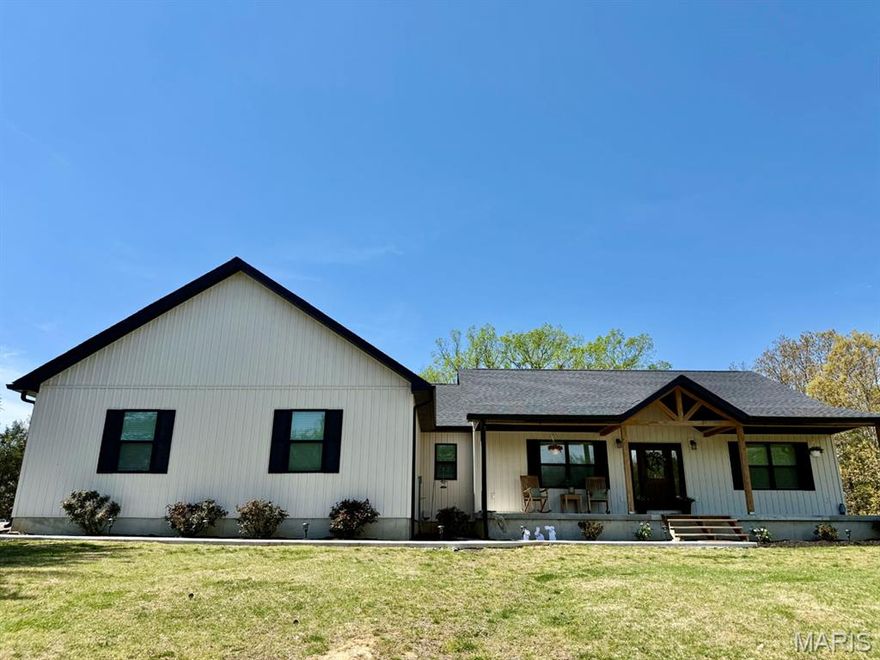 Discover Modern Farmhouse living in this newly built 2024 home with 2x6 walls.  It’s all electric with 9ft ceilings on main floor and in basement.. This thoughtfully designed property features 3 bedrooms and 2.5 baths on the main level, with luxury plank vinyl flooring throughout for both style and durability. The kitchen is equipped gorgeous Rustic Alder cabinets, granite countertops and a spacious walk-in pantry, offering both functionality and appeal. The primary suite includes a private full bath and a large walk-in closet, creating a comfortable retreat that also walks out to a covered back deck.  The walkout basement provides an additional 1,355 square feet of potential living space. It is framed for 2 additional bedrooms, a full bathroom (with tub and toilet already installed and plumbing in place), a large family/rec room and a designated storage area. With concrete floors, it’s ready to be customized to suit your needs.  The oversized garage is 30x30.  Sitting on 3.4 acres you will enjoy the privacy and space of country living while remaining conveniently close to town. This property offers the perfect blend of modern construction, acreage, and future expansion opportunity.