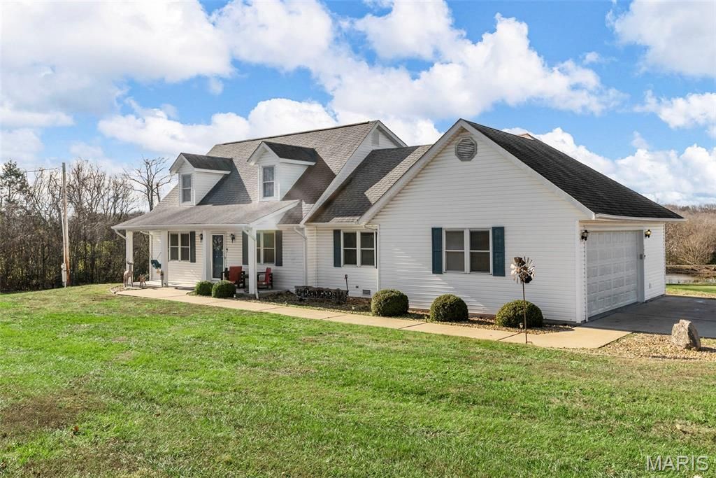 Photo of 1937 N Commercial Avenue, St Clair, MO 63077 (MLS # 25080357)