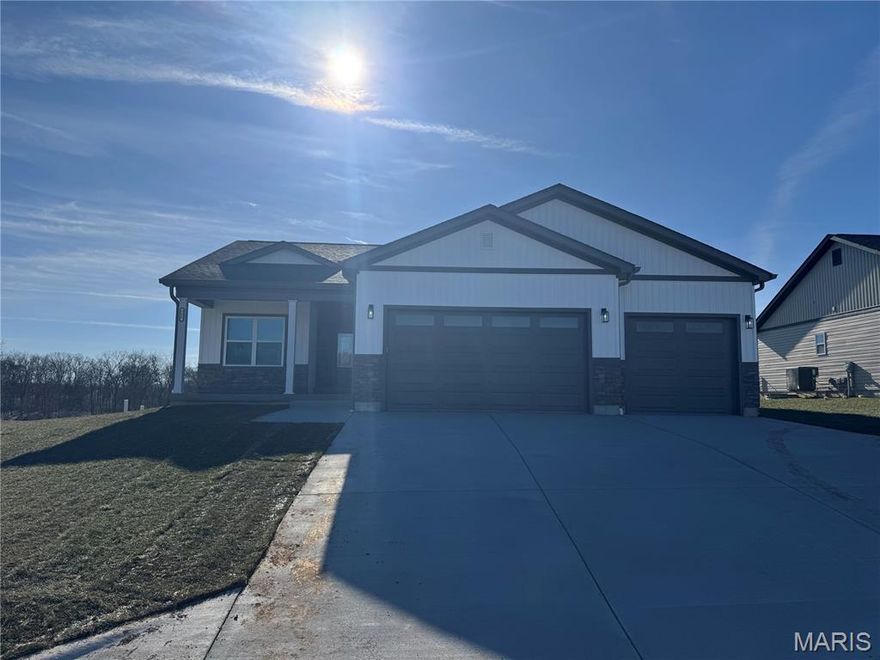 Brand New Construction that is going to check all the boxes on your checklist. This 5 bedroom 3 bath has all the space and storage that you've been looking for. On the main level you'll walk into a wide open living area that flows right into the kitchen and dining area for easy entertaining. The kitchen has all appliances and granite countertops with a separate pantry for extra storage. From the kitchen you can flow right into the Master suite, the large bedroom and massive bathroom give you plenty of space. The bathroom has a custom tile shower and large walk in closet that leads into the laundry room. There are two more bedrooms and a full bath on the opposite side of the house of the main level for the rest of the family or a great spot for the in home office. But that's not where it ends, take the stairs into the basement where you will find a large family room complete with a wet bar for the ultimate spot to watch the game or host game nights. There are two more large bedrooms in the finished basement with a full bath separating the two them. With large egress windows plenty of natural light gets in during the day. In the unfinished portion of the basement you will have a ton of storage space that will share the room with your HVAC, hot water heater, and the whole house dehumidifier. The builder did truly think of everything when putting this house together. Luxury vinyl plank throughout the main level and basement with carpet in the bedrooms. On the exterior the garage is massive!! 3 car garage that is 32' by 21' with all the room you could dream of for storage, from the garage into the house you will step into a nice small mud area off the laundry room to kick off your shoes and drop your bags after a long day. Then around the back you will have a large covered patio area for outdoor entertaining and the perfect grilling spot. Could go on and on but with just under 3,000sqft of finished space this house is a must see.