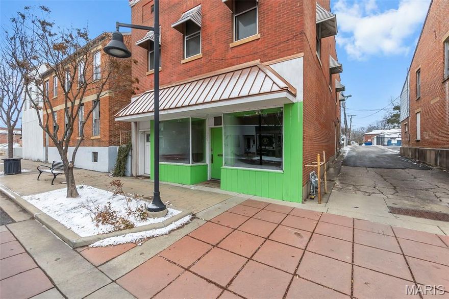 Discover a versatile investment opportunity on Broadway! The upper level features a beautifully remodeled 1 bedroom apartment complete with hardwood floors, exposed brick accents, and a private entrance...perfect for rental income or an owner occupant. The street level commercial space offers excellent visibility with prominent Broadway frontage and expansive display windows, ready to be reimagined and finished to suit your business or tenant needs. So much potential in a prime location!