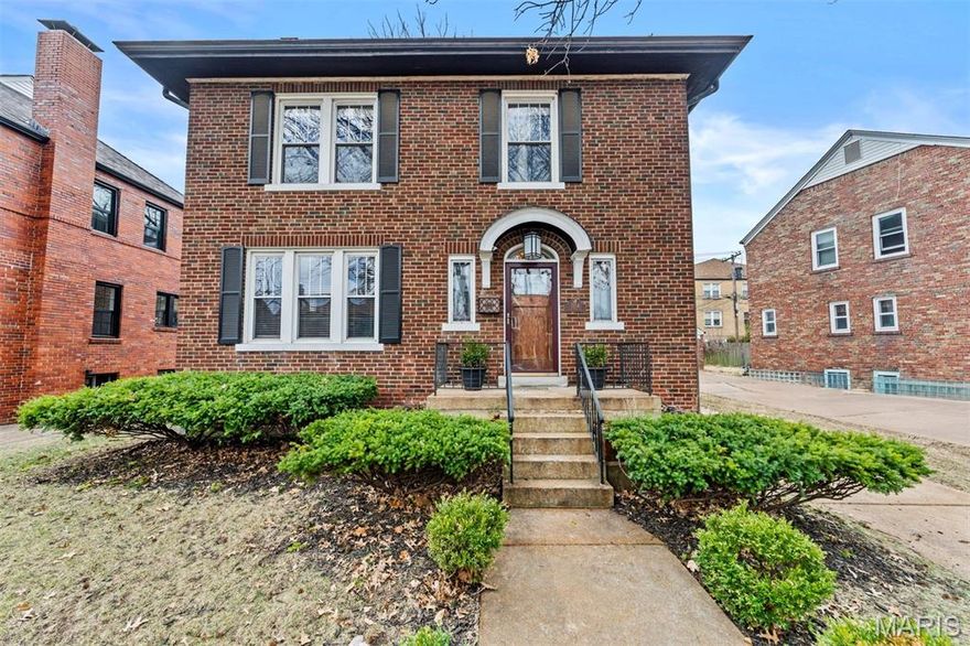 Tucked along a quiet, tree lined street in the heart of University Park, this timeless all brick home blends classic University City charm with a rare, modern floor plan designed for today’s living. A gracious entry foyer with a charming window seat sets the tone, leading to a spacious living room anchored by a gas fireplace and framed with stunning stained glass windows. The renovated eat in kitchen opens seamlessly to the dining area, creating an expansive, light filled space that is both functional and inviting, a true rarity for the neighborhood. A main level half bath adds convenience. Upstairs, the dreamy primary suite offers a spa like bath and an extraordinary walk in closet that feels custom tailored. Two additional bedrooms and a beautifully appointed full bath complete the second floor. The walk out lower level provides exceptional versatility, currently styled as a gym but equally suited for a private office, playroom, or media space. Outside, enjoy a fenced yard, patio perfect for entertaining, and a detached two car garage. Designer finishes throughout create a calm, serene atmosphere that feels both elevated and welcoming. All of this just moments from neighborhood coffee shops, restaurants, and parks, the very best of University City living, right outside your door.