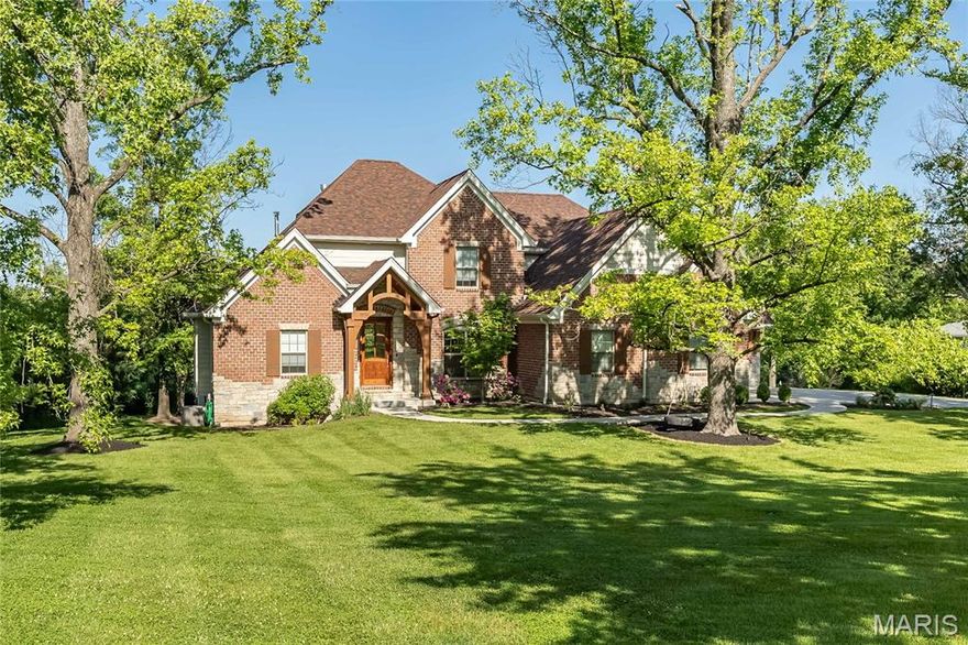 Built in 2021 & overflowing with charm & architectural detail, this stunning home offers over 4,000+ sq ft of beautifully designed living space on a private and safe .94-acre lot. From the picturesque patio to the sparkling pool and fully fenced backyard, you can enjoy the sunset from the privacy of your deck or master balcony. Inside you will find 5 bedrooms, 5 full bathrooms and 1 half bath. The kitchen features a huge island, ss appliances, gas cooktop, & a walk-in pantry. The eat-in kitchen also has countertop seating with a slider to the patio! The main floor primary suite features an outdoor seating area, plus an elegant primary bath with dual vanities. You will find beautiful hardwood floors throughout the home & natural light pours in through the oversized windows. The finished LL has an additional bedroom & bath, a media room, a wet bar featuring Brazilian countertops & walks out to the pool & fire-pit area. Main floor laundry, 3 car garage, irrigation system & a private office top off this perfect home. Perfect for neighborhood walks, running or biking around. One mile from two major highways, (270 & 40), close proximity to all private schools including MICDS, John Burroughs, Whitfield and minutes to wonderful restaurants in Creve Coeur, Frontenac and Clayton.
