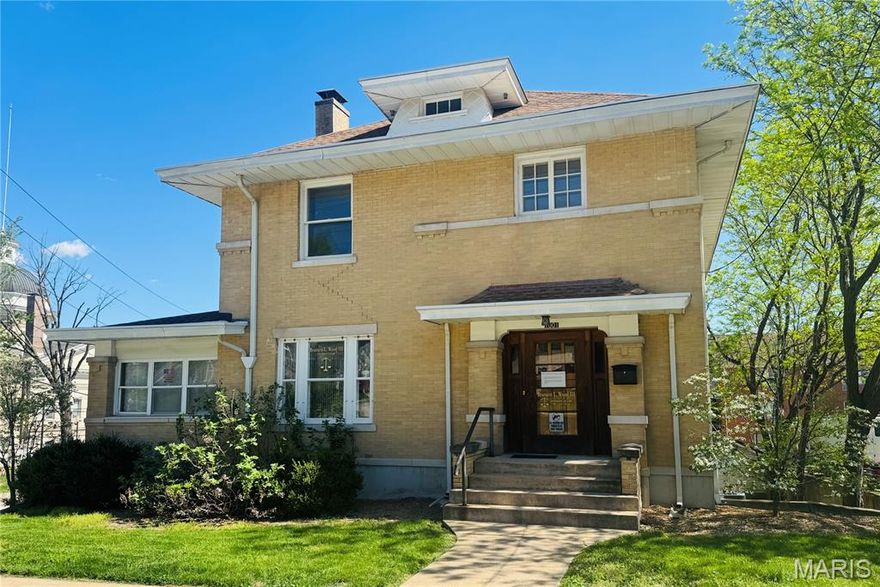 Please note: While the property has been used as an attorney’s office since 1992 and office contents are still being removed, the true story here is the home itself. Look past the furnishings and discover the remarkable historic charm of this one-of-a-kind residence. Known as the Dulany Mahan House, this Prairie-style home reflects architectural influences reminiscent of Frank Lloyd Wright. Built in 1913, the home was commissioned by Dulany Mahan, a local attorney with deep ties to the First Christian Church—where he later married the minister’s daughter. The home eventually served as the church’s parsonage, adding another meaningful chapter to its history. Offering 2,590 square feet of total living space, the home features 4 bedrooms and 2.5 baths. From the moment you step inside, you’re greeted by a beautiful staircase and the warmth of hardwood flooring throughout most of the home. The large living room has high ceilings and a fireplace (non-functioning), creating an impressive yet inviting space. The kitchen is located at the rear of the home, with cabinets removed, providing a blank slate for your vision. A butler’s pantry connects the kitchen and dining room, a timeless feature. The wraparound enclosed porch is filled with natural light and is divided into 2 spaces—one used as a conference room and the other as a large L-shaped office—both offering flexible use. A half bath completes the main level. Upstairs you’ll find 4 bedrooms, some with step-in closets and charming transom windows. One bedroom includes an adjoining room that would be ideal for a nursery, sitting room, or walk-in closet. A sleeping porch off one of the bedrooms adds even more historic character. Unfinished basement provides good storage with one garage and opener. This is a rare opportunity to own a home rich in history, architectural character, and potential—ready to be reimagined for its next chapter at 1001 Center Street. Must see in person! Property being offered in its current condition.