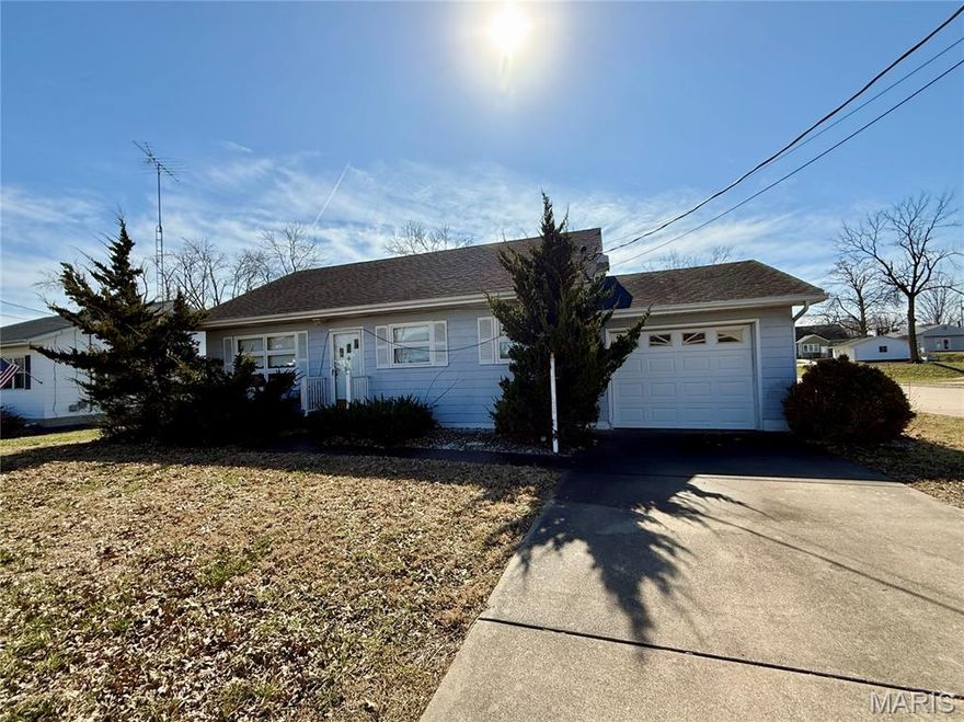 Built in 1957, this well-maintained 1.5-story home offers 3 bedrooms, 2 full baths, and 1,264 square feet of main living space, plus an additional 512 square feet of finished basement area, giving you room to spread out and make it your own. Step inside to find original hardwood floors, doors, and trim that showcase timeless craftsmanship and character throughout. The spacious rooms provide comfortable living, while the finished basement expands your entertaining options with a recreational area, built-in bar, family room, and abundant storage space. While the home reflects its era and would benefit from cosmetic updates, it has been well cared for and is in very good condition, making it a wonderful opportunity to add your personal style and build instant equity. Outside, you’ll appreciate the convenience of a 1-car attached garage plus a 1-car attached carport that can easily double as a covered patio for outdoor gatherings. A utility building provides extra storage for lawn equipment and tools, and the level corner lot offers great curb appeal and usable yard space. If you’re looking for solid construction, original charm, and the chance to make a home truly your own, this one is full of potential!