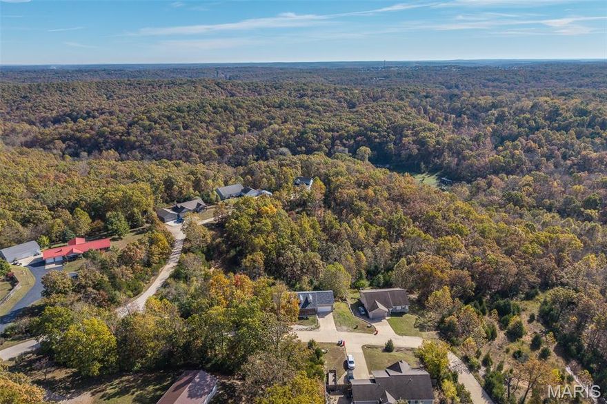 parcels 10-5.0-15-000-000-004.008, 10-5.0-16-000-002-103.002
Experience the beauty of the Ozarks from your own private acreage just minutes from St. Robert and Fort Leonard Wood. This incredible 18.17± acre property combines two contiguous parcels offering a rare opportunity for privacy, investment, and development potential. With gently rolling topography, a mix of open and wooded terrain, and multiple clearings, the land is ideal for building your dream home, establishing a hobby farm, or creating a private recreational retreat.

The front portion of the property features open ground suitable for a future driveway, home site, or pasture space, while the back acreage transitions into mature hardwood forest filled with deer, turkey, and natural Missouri wildlife. The property has access to public water and electric nearby, and the layout offers several natural build sites with a scenic view of the surrounding hills. Whether you’re looking to build immediately or secure land for future development, this tract provides the flexibility and size rarely found this close to town.

Situated less than 10 minutes from shopping, dining, and schools, and under 15 minutes from Fort Leonard Wood, you’ll enjoy country peace without giving up convenience. The acreage is easily accessible from paved county roads and lies just off Horizon Way, offering both seclusion and connectivity. The land could support multiple dwellings, cabins, or barndominium-style builds—each enjoying privacy thanks to the natural landscape and spacing between clearings.

For those seeking investment or multi-family potential, the combined parcels offer ample space to subdivide or retain as one large homestead. The property’s balance of open and wooded areas supports a variety of uses—livestock, hunting, ATV trails, or future build-out projects. Gentle slopes and existing natural drainage simplify site planning, and utilities are close enough to minimize development costs.

With few large tracts remaining in this desirable corridor of Pulaski County, this offering represents one of the best combinations of size, location, and potential on the market today. Whether you’re building a forever home, investing for future appreciation, or creating a weekend retreat, this property has the foundation to fit your vision.

Enjoy the quiet of rural Missouri living, the beauty of the natural surroundings, and the convenience of being minutes from the amenities of St. Robert and the gateway to the Mark Twain National Forest. Explore it in person to fully appreciate the views, the space, and the possibilities that await.