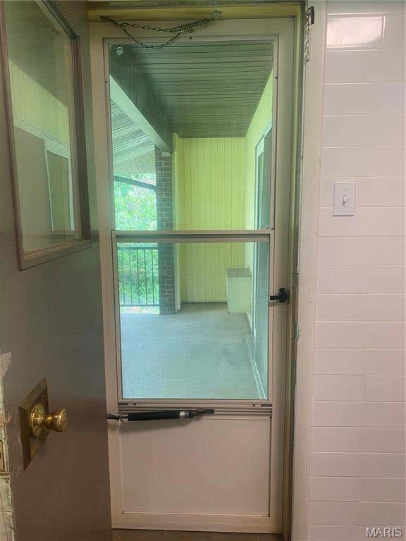 Photo of 7598 E Hazelcrest DR #E, Hazelwood, MO 63042 (MLS # 26042466)