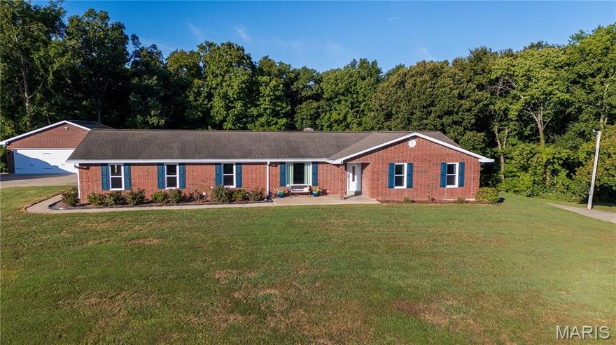 This one checks all your boxes!  Sprawling, updated brick ranch on a 2 acre lot conveniently located inside Jackson city limits.  Plenty of parking for 5 vehicles and an RV with an oversized attached 2 car garage, AND a detached 36X36 3 car garage/shop building.  There's even a small 2 stall barn on the property.  Need more land?  No problem, the 1.39 acre lot next door is also available for $79,000.  The home itself features gorgeous wood floors throughout most of the main level. A chef's kitchen with tons of custom cabinetry, granite countertops, and a huge island.  ML laundry with a walk-in pantry.  The primary ensuite features a walk-in closet, soaking tub and separate shower.  The walk-out lower level offers a family room with fireplace, 3rd bathroom, and an office.  What more could you ask for?
