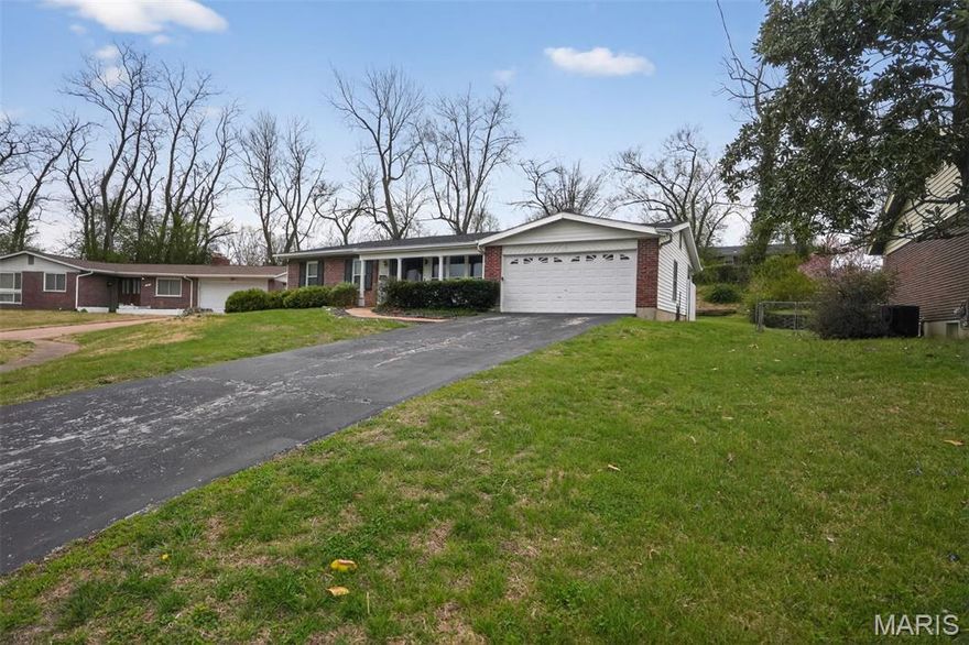 Welcome to this charming and spacious 1,590 sq. ft. ranch-style home tucked away on a quiet cul-de-sac in the desirable Highland House North subdivision. This well-maintained 3-bedroom, 2-bathroom residence offers an inviting open layout, perfect for both comfortable living and entertaining. The interior features a formal living room, a separate dining area, and a cozy family room highlighted by a decorative fireplace and classic ceiling beams. The large master suite boasts double closets and a private ensuite bathroom. Recent updates include fresh paint, new windows throughout, and a mix of stylish vinyl and plush carpeted flooring. The kitchen comes equipped with all-black appliances, updated countertops, and a convenient breakfast counter. Step outside to a private, fully fenced backyard with a patio, ideal for pets and outdoor gatherings. Completing this home is a massive partially finished basement providing ample storage and a 2-car attached garage. Ideally located near Chambers Road with easy access to I-270, shopping, and local parks. This move-in-ready gem in the Ferguson-Florissant School District is a must-see!