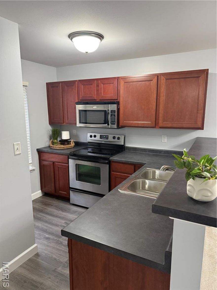 Newly remodeled 2 bedroom, 2 bath ground level condo in St Peters available. No step entry!  Updated!  All Electric! New flooring, paint, countertops, hardware, base, some lighting, and enhanced closet systems.  Comes with all appliances.  Kitchen appliances are stainless steele and include fridge, stove/oven, dishwasher, microwave.  Washer and dryer are included with the unit as well!  
Primary bedroom suite has a bathroom with shower (2 seats in the shower as well) and and a custom walk in closet.  Second bedroom has a custom reach in closet.  
Walk out onto the patio from the living room.  Storage closet located off the patio.
Complex is wonderfully maintained and beautiful 
Complex is closet to the lovely Laurel Park that has fishing, playgrounds, ball fields, trails, pool, and courts.  The St Peters trails all connect to each of the St Peters Parks including Recplex.  This location is centrally located and close to major hwys 94, 364, 70, 40-61, 270, and 370.  Close to shopping and restaurants.
Agent owned.