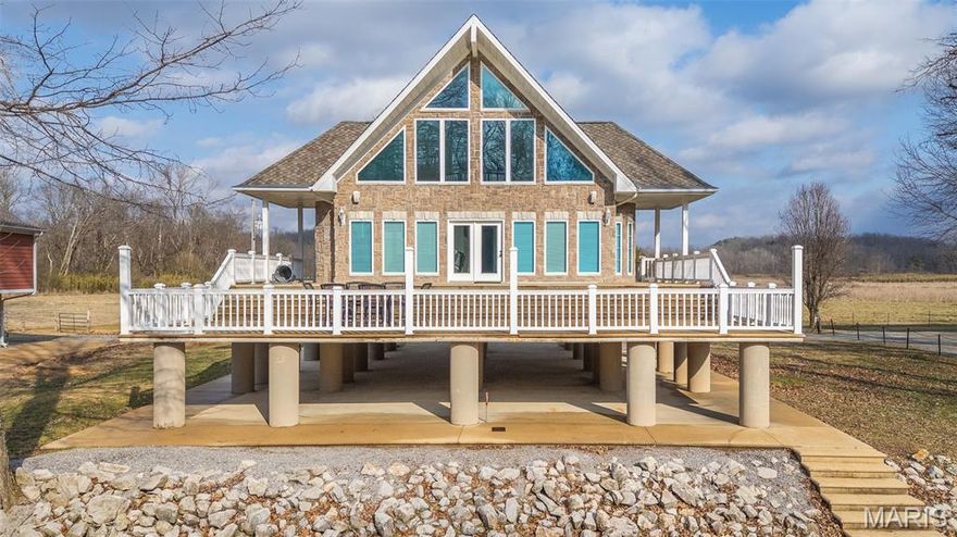 Waterfront stone home on the Current River in Doniphan, Missouri! This charming 3-bedroom, 1-bath property offers stunning views up and down the river and is the perfect retreat or investment opportunity. Built entirely of stone, the home features rustic character with modern comfort and comes full furnished, making it truly move-in ready. Inside, you'll find a spacious bathroom with a large soaking tub, ideal for relaxing after a day on the water. Step outside to the huge riverfront deck, perfect for entertaining, grilling, gathering around a fire pit, or simply enjoying the peaceful scenery. Whether you're looking for a full-time residence, weekend getaway, or vacation rental, this rare waterfront property delivers unbeatable views, privacy, and charm.