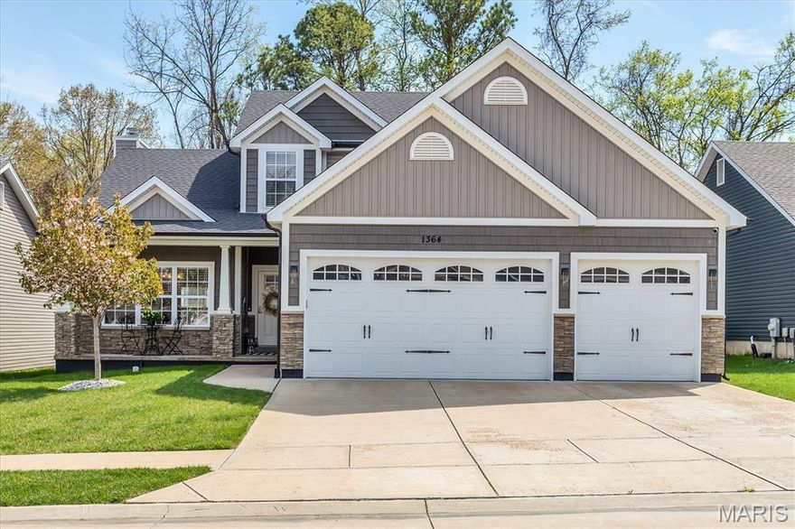 Welcome to 1364 Grey Wolf Drive in Imperial, where modern design meets everyday comfort. Built in 2020, this beautifully maintained 1.5-story home with a 3-car garage offers a bright, open layout filled with stylish finishes and designer lighting. Step inside to a welcoming foyer with 9-foot ceilings, leading to a versatile front dining room or flex space with sliding barn doors, perfect for a home office or formal dining. The impressive great room features soaring 12-foot ceilings, a cozy fireplace, and a dramatic wall of windows that floods the space with natural light. The kitchen is truly the heart of the home, designed for both function and entertaining, with a large center island, sleek countertops, tile backsplash, 42” cabinetry, stainless steel appliances, and an adjoining breakfast room. The main-floor primary suite offers a peaceful retreat with a spacious layout with a luxurious bath, and walk-in closet. A convenient main-floor laundry room and powder room complete the main level. Upstairs, you’ll find two generously sized bedrooms and a full bath, providing plenty of space for family or guests. The finished lower level expands your living options with a large recreation area, bonus room ideal for a home office or fitness space, ample storage, and a rough-in for a future bathroom. Enjoy outdoor living on the composite deck overlooking a beautifully landscaped, tree-lined backyard with decorative retaining wall, perfect for relaxing or entertaining. Meticulously cared for and move-in ready, this home conveniently located with easy access to I-55, offers style, space, and functionality and is ready for you to call home!