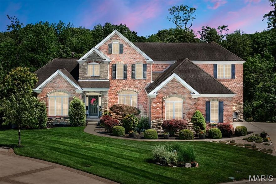 Stunning 1.5-Story Brick Front Home on Quiet Cul-de-Sac! With over 5,300 sq ft of living space, 4 bed, 6 bath beauty offers luxury, function, and style. Enjoy a spacious 3-car side-entry garage, new deck w/ iron spindles, private, wooded backyard featuring a gazebo over-looking the neighborhood pond, and fire pit—perfect for entertaining. Inside. Main floor boasts a two-story great room with gas fireplace and built-ins, open floor plan.  Custom kitchen with new quartz counters, and a cozy hearth room. The primary suite includes dual walk-in closets, jetted tub, shower. Office connects to primary suite. 3 bedrooms, 2 full baths on the second floor. The finished walkout lower level features a large family room, custom dance floor, bar with beverage fridges, workout room, tiled walk-in shower, and a relaxing sauna. There's even space for a hot tub under the new deck! All this PLUS access to Lake St. Louis Community Association amenities: lake rights, pool, golf, clubhouse & more!